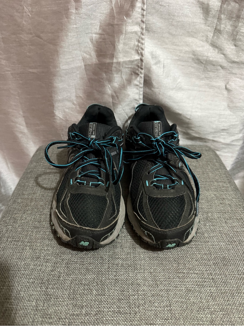 New Balance Black Sneakers with Teal Lining
